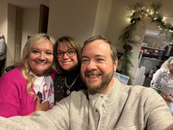 Susan with friends at a holiday event